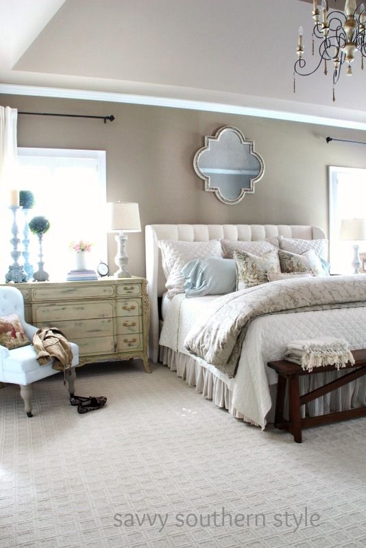 Patterned carpet in master bedroom