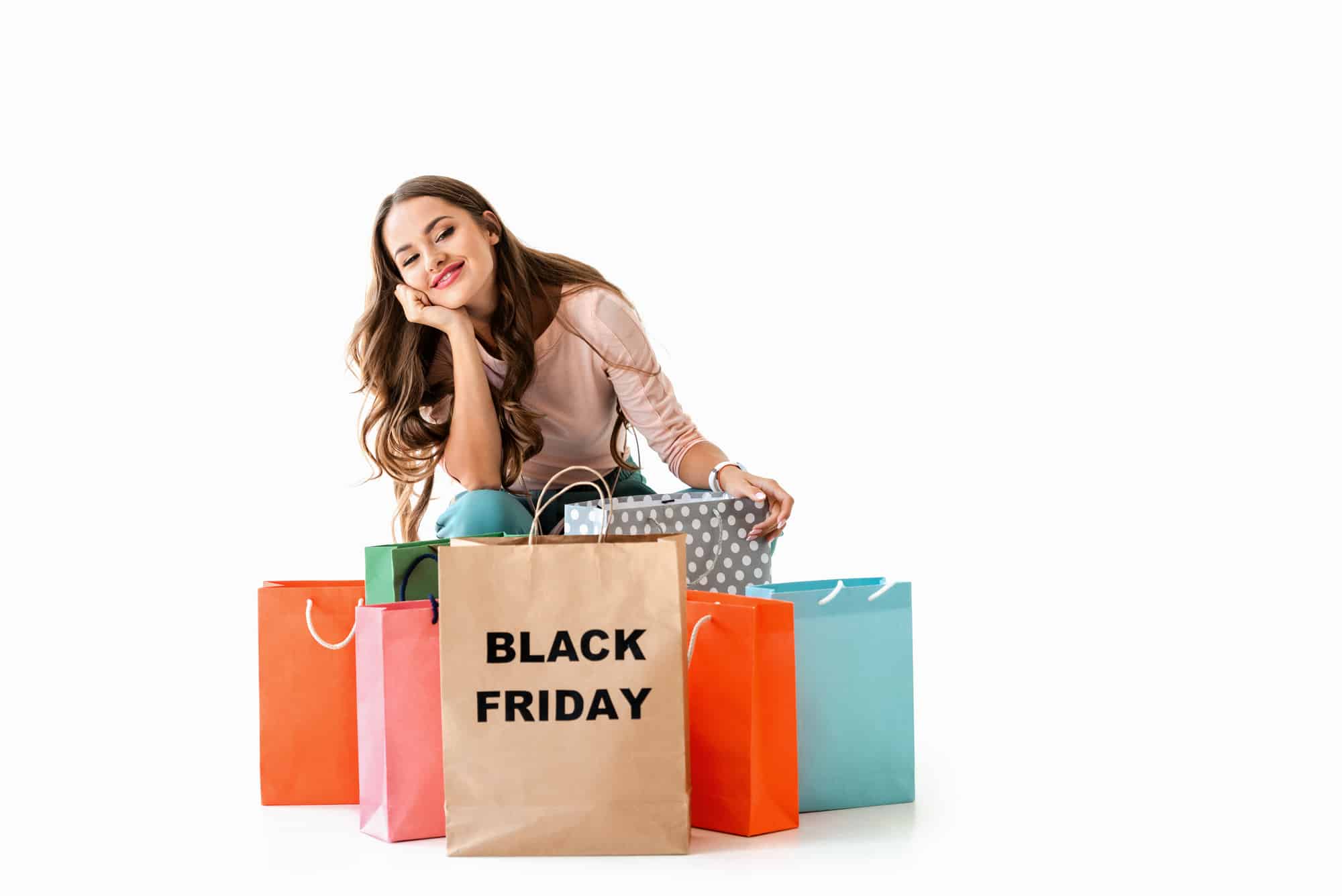 Best Black Friday deals for families: Lady with shopping bags that say Black Friday