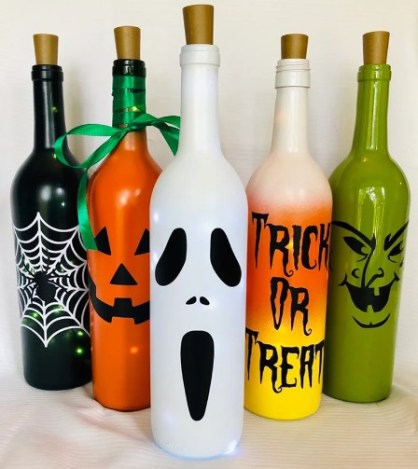 Creepy Halloween painted bottles with string lights