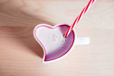 Strawberry Milkshake in Lovely Heart Shaped Cup Free Photo