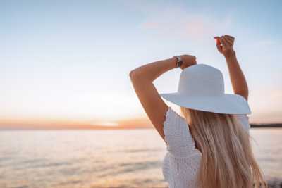 Woman Dancing and Enjoying Beautiful Sunset Free Photo