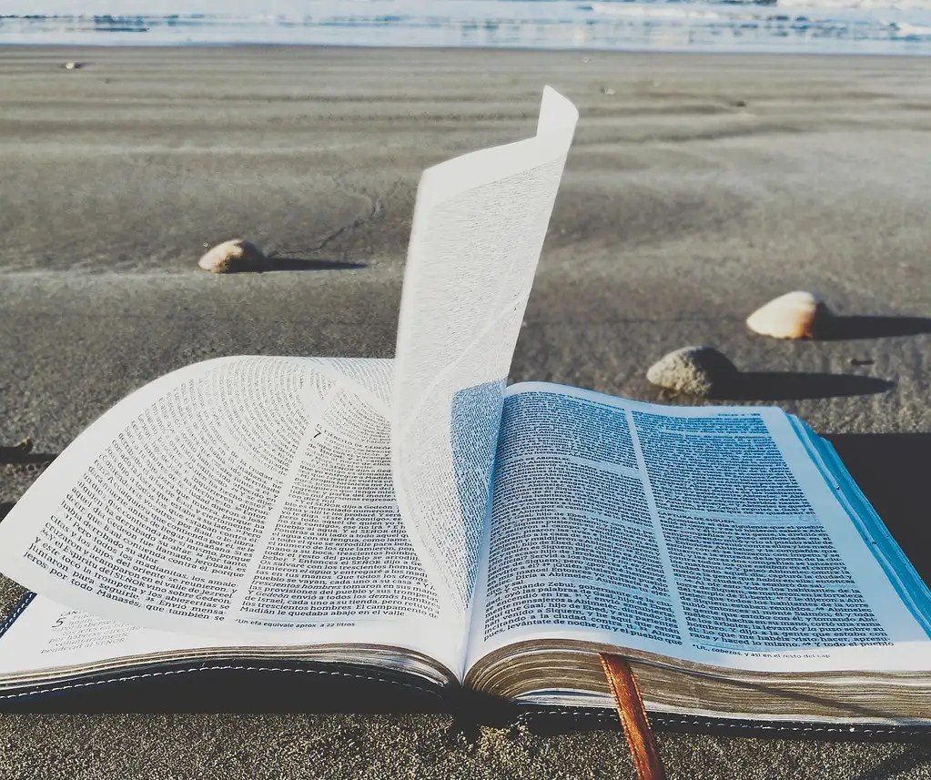 Bible on beach