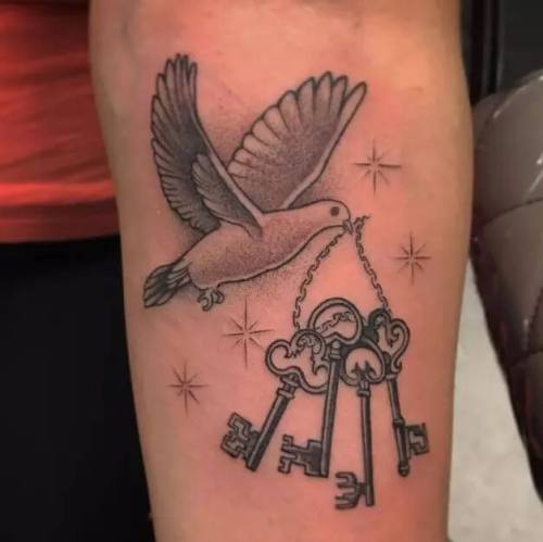 Dove And Keys Tattoos On Forearm