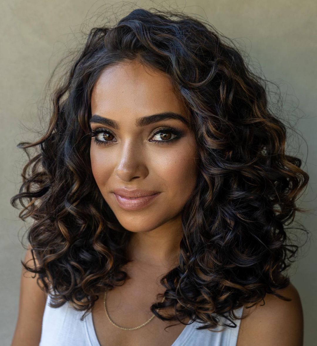 Image of Long layered curls hairstyle for oval face