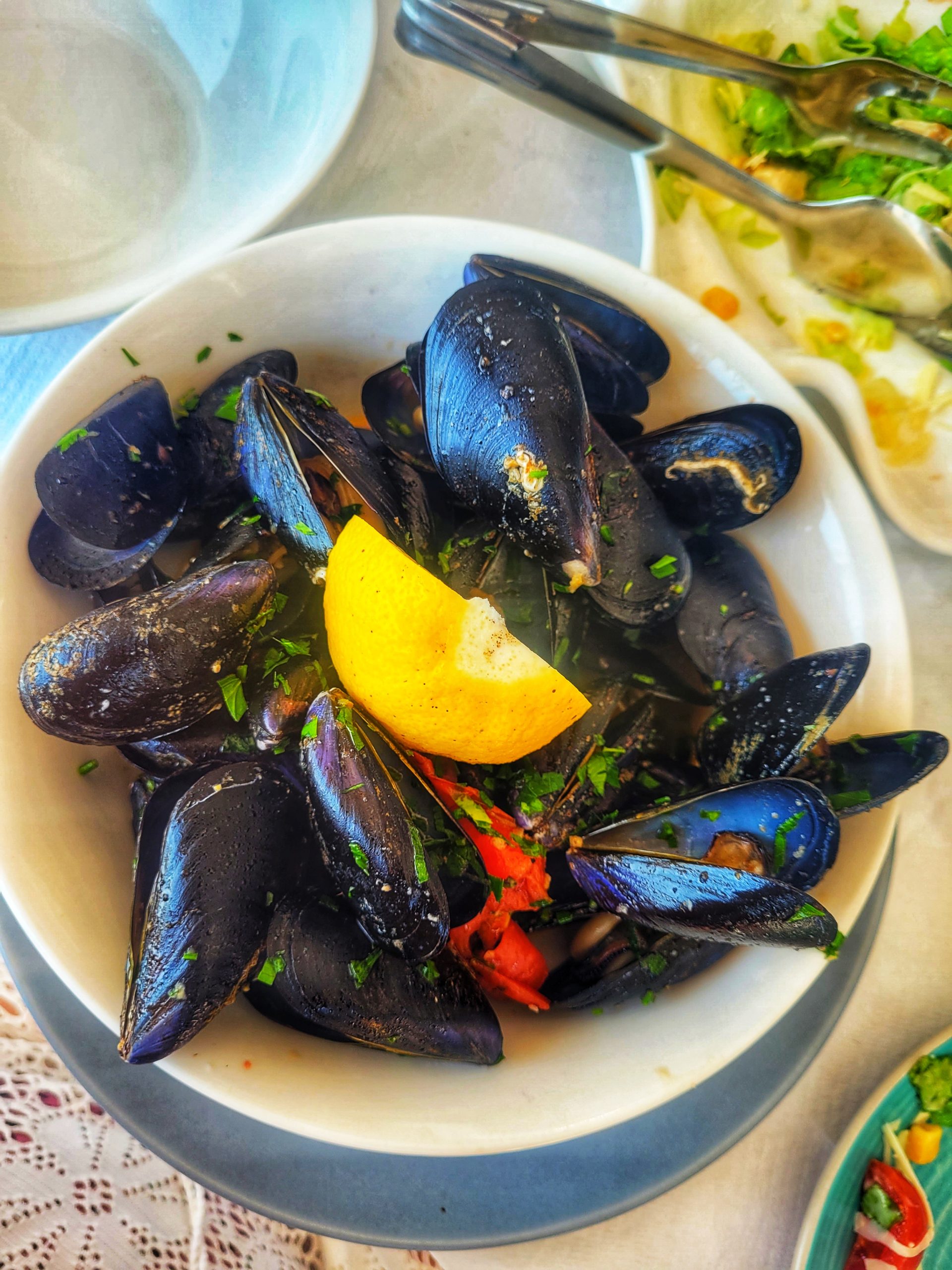 A bowl of mussels and lemon - a staple food on your holiday in Albania. 