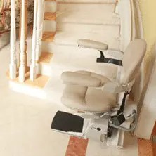 A curved stair lift.