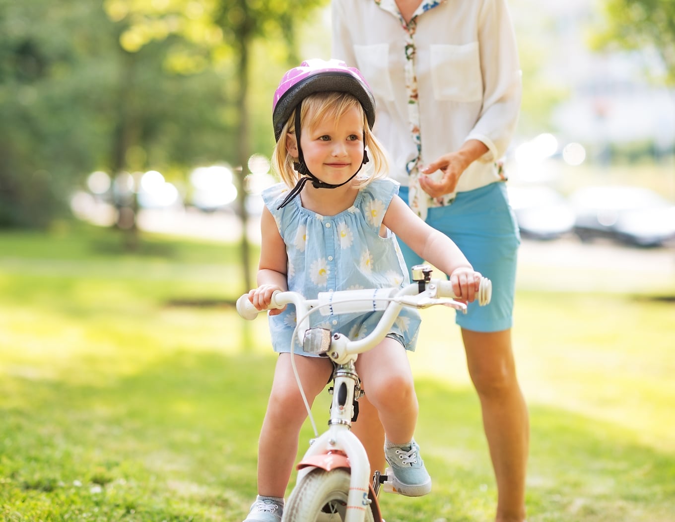 Child Learning to Ride a Bike