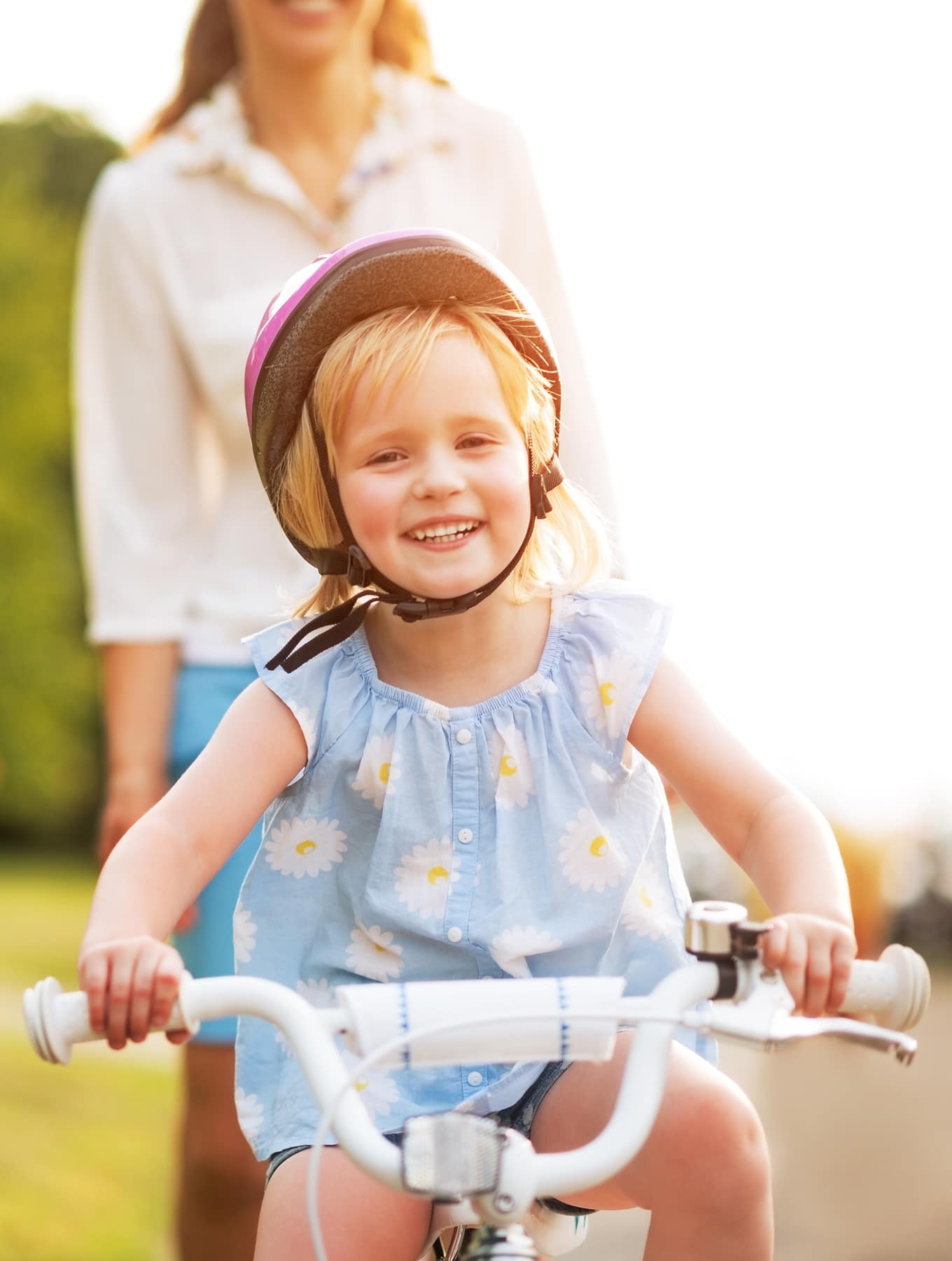 Child Learning to Ride a Bike