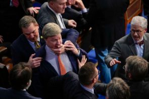 Rep. Richard Hudson restraining Mike Rogers as he confronts Rep. Matt Gaetz on the House floor