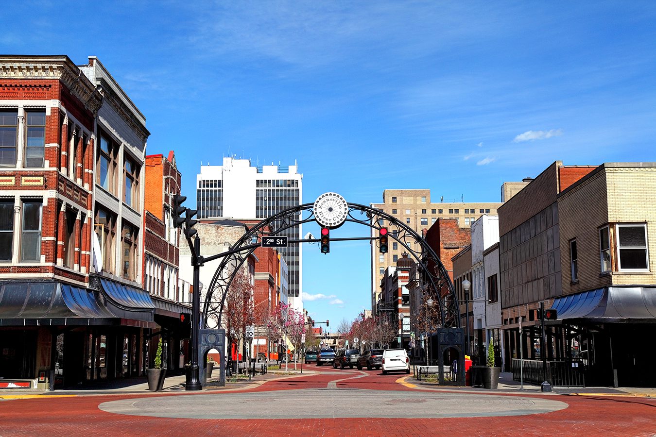 Downtown streetscape with decorative arch.