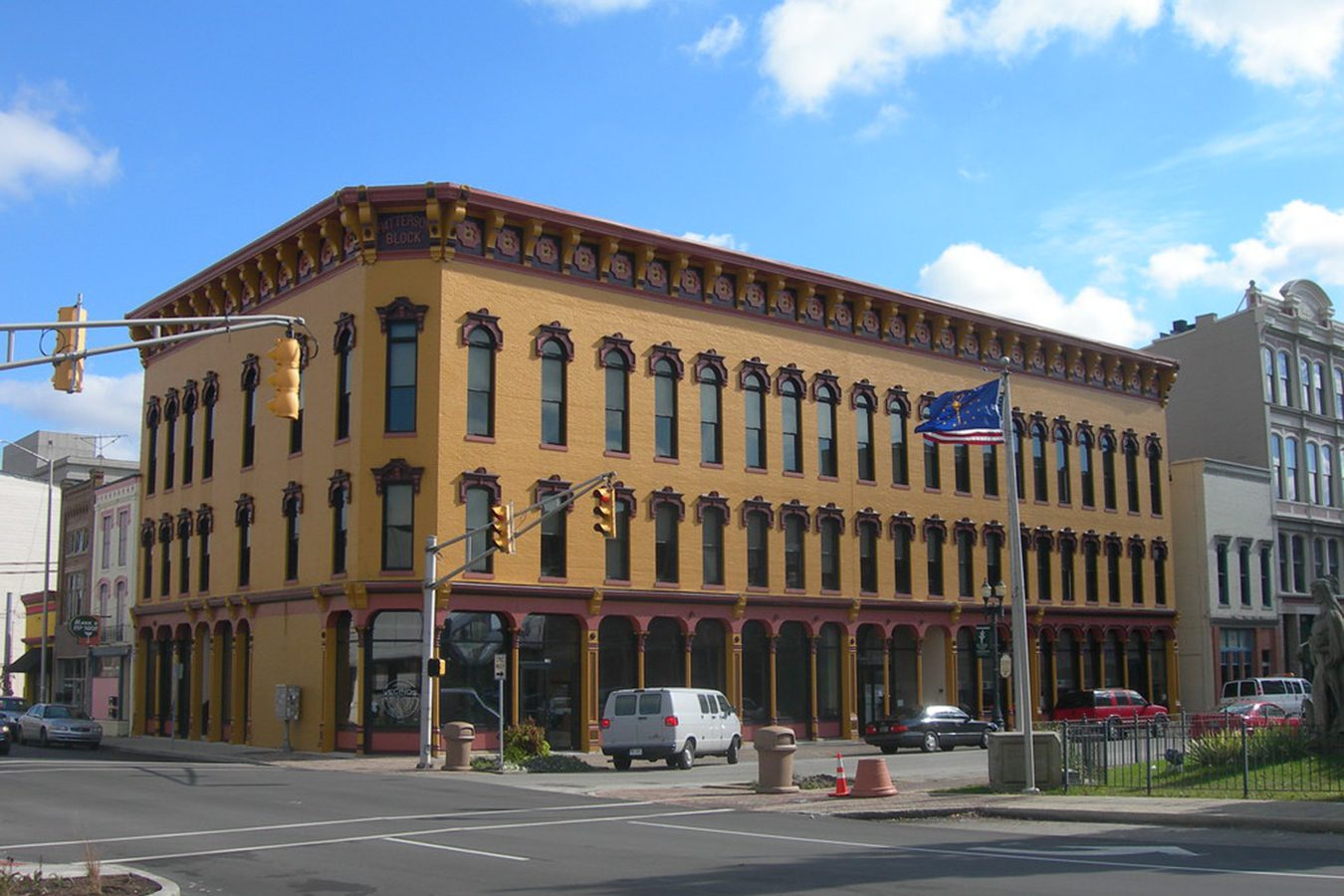 Here's an alt tag for the image: Atters Block, historic building, yellow brick.