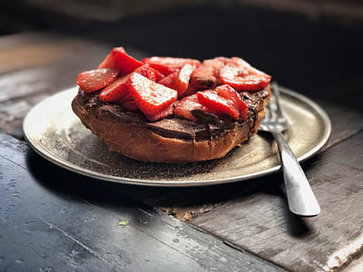 bread covered with chocolate and strawberry