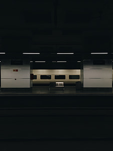 landscape photo of train station bench