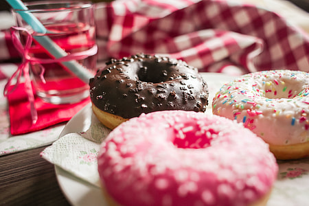 Three Yummy Sweet Colorful Donuts