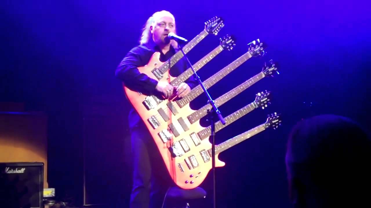 Bill Bailey playing his 6 neck guitar - YouTube