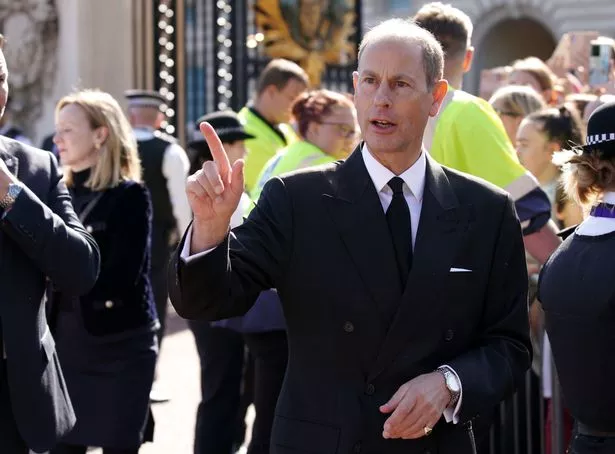 Prince Edward, Earl of Wessex greets well-wishers outside Buckingham Palace 