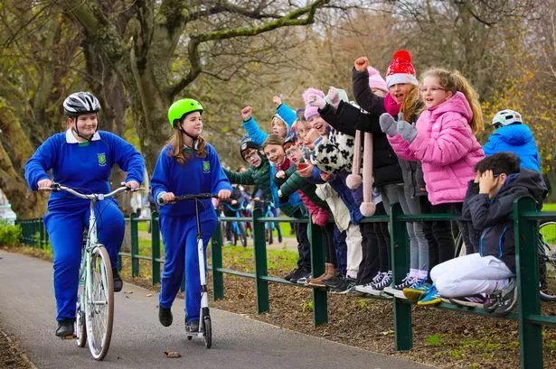 From left, students, Irina Diaconu and Wiktoria Bosowska, from St Mary's Fairview, being cheered on by students from Howth Rd Mixed National School, who were on hand to help Dublin City Council announce the official opening of the highly anticipated Clontarf to City Centre (C2CC) Active Travel Project connecting the Royal Canal Greenway to the East Coast Trail and part of the Tolka Valley Greenway