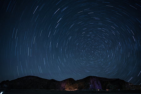 silhouette of mountain during nighttime