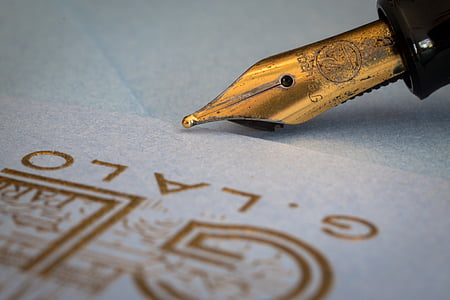 black and brown fountain pen in closeup photo