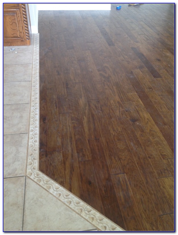 Dark Wood Floor Transition To Tile