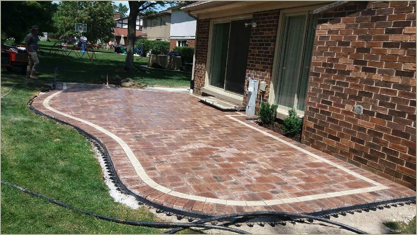 Concrete Patio With Brick Inlay