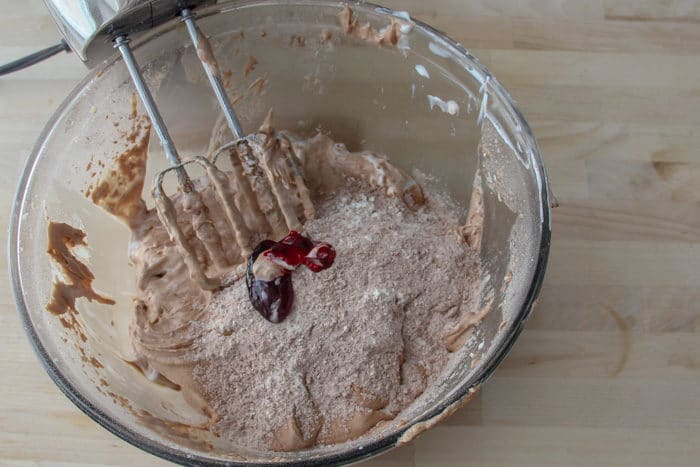 Adding red food color to the batter