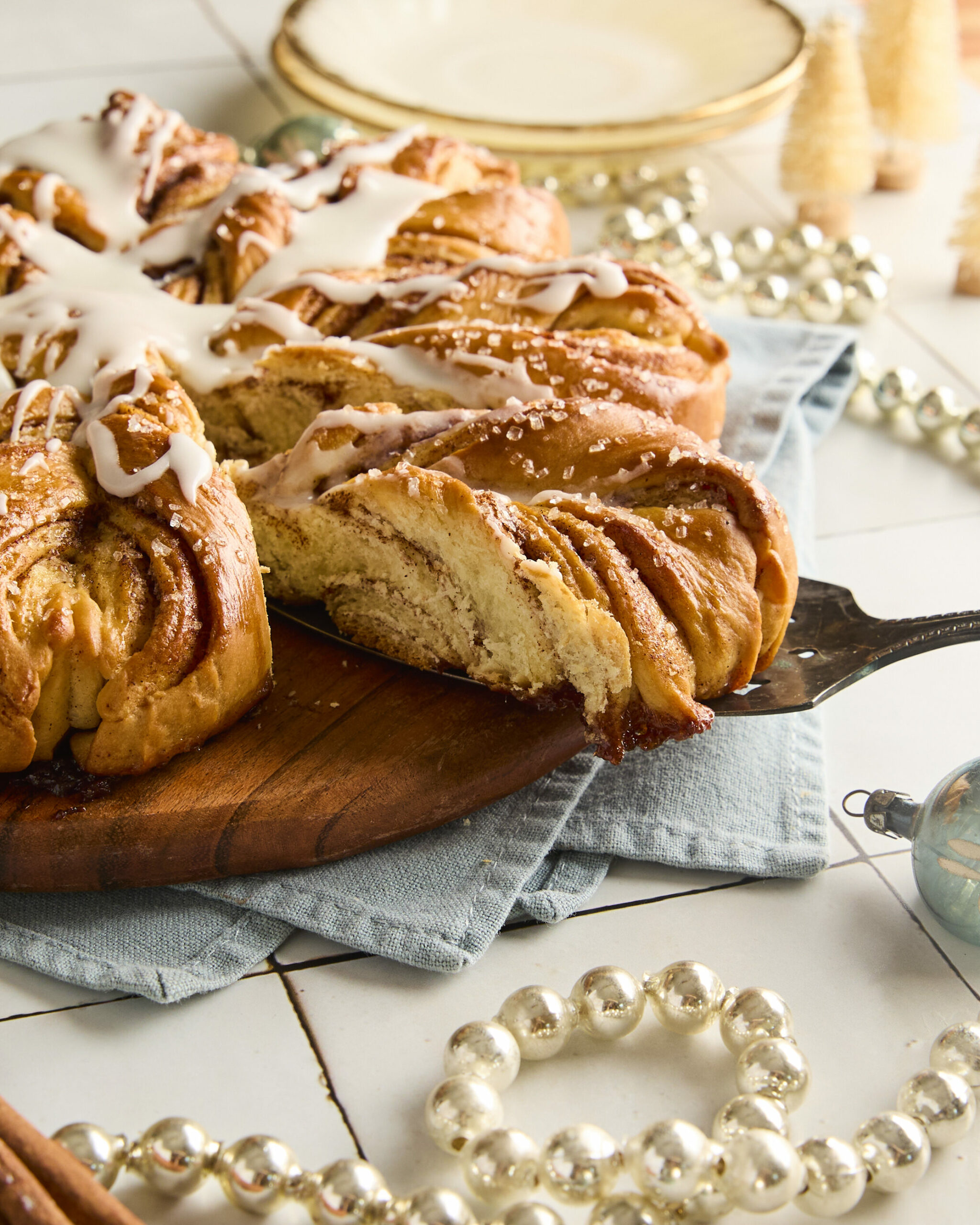 snowflake bread being served on a wooden board