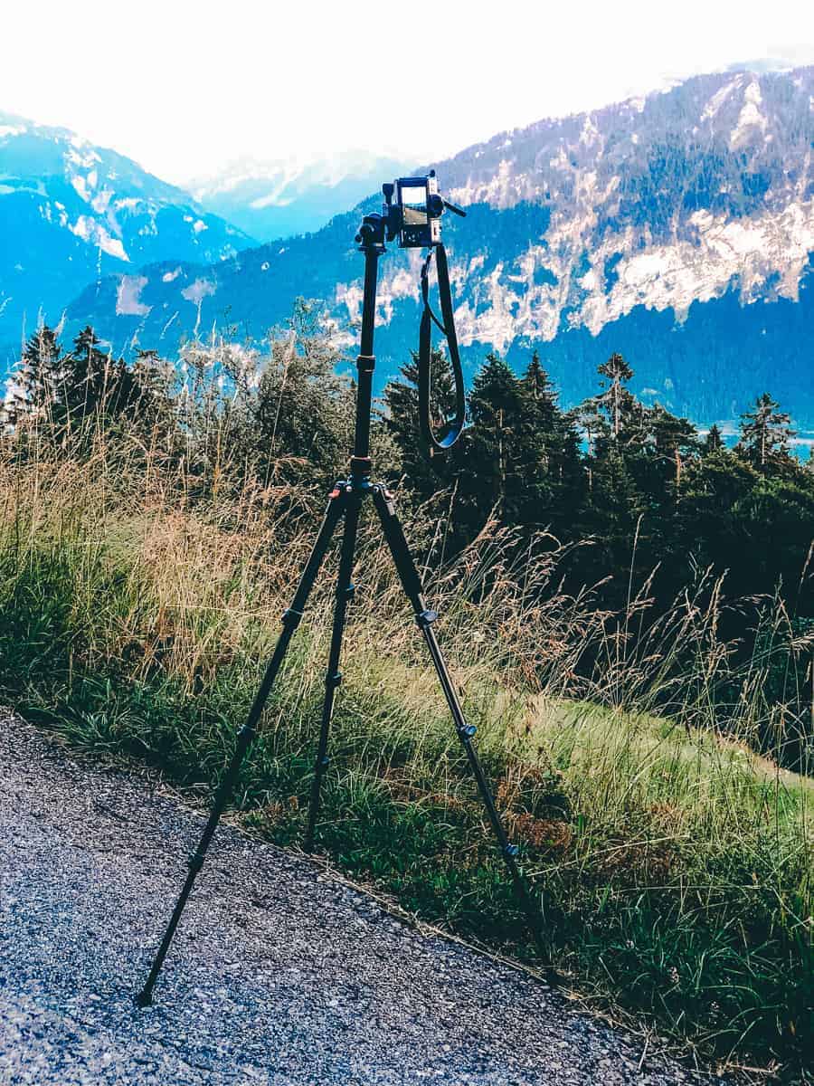 Best travel photography tripod set up overlooking the Swiss Alps