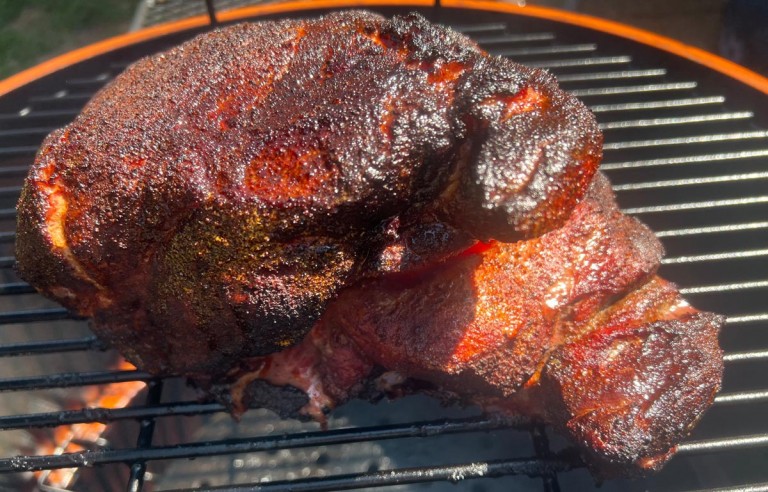 competition-style pork butt on the grill