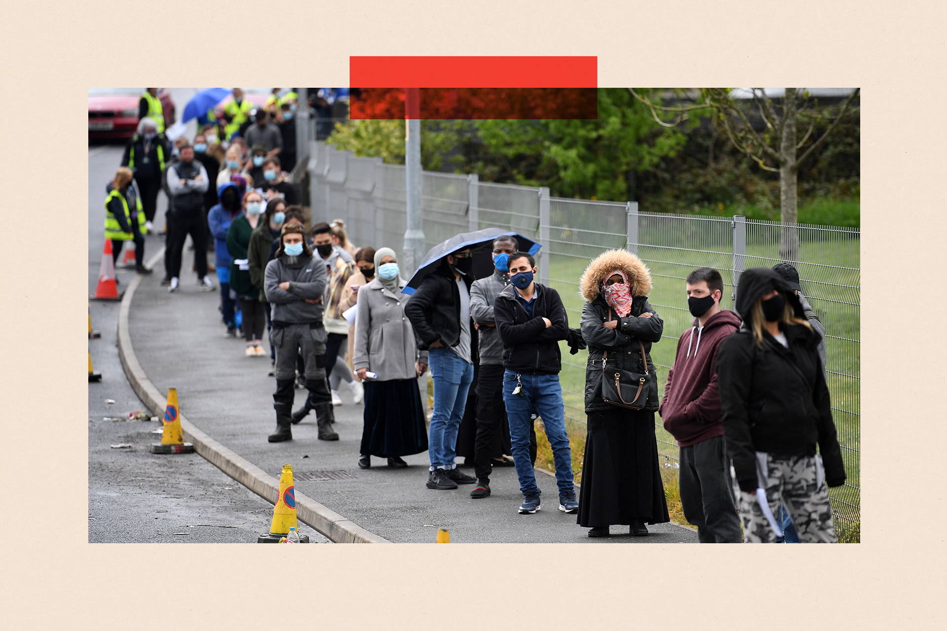 Members of the public queue to receive a Covid-19 vaccine 