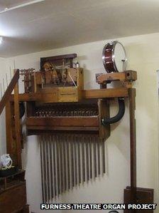 Part of the organ hidden under the stage