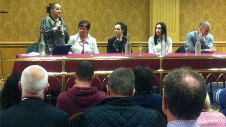 Organiser Catherine Logue addresses the public meeting