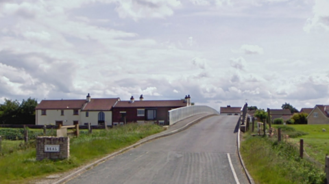 A bridge heading into the village of Beal