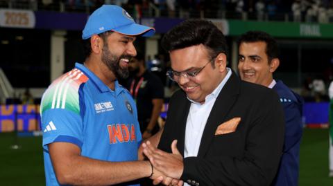 India captain Rohit Sharma (left) is congratulated by ICC chair Jay Shah (right) after the Champions Trophy win