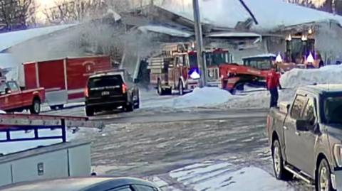 Moment firehouse roof caves in under heavy snow