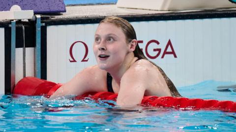 Poppy Maskill smiling on the lane rope