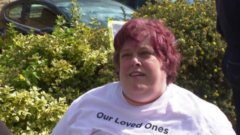 Gemma Blagbrough wearing a white t-shirt with Our Loved Ones written on it