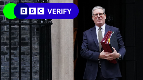 Keir Starmer walking out of the door of 10 Downing Street carrying three folders. The BBC Verify lozenge is in the top left corner.