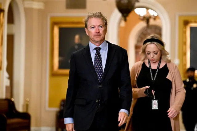 Sen Rand Paul walks the halls of the US Capitol