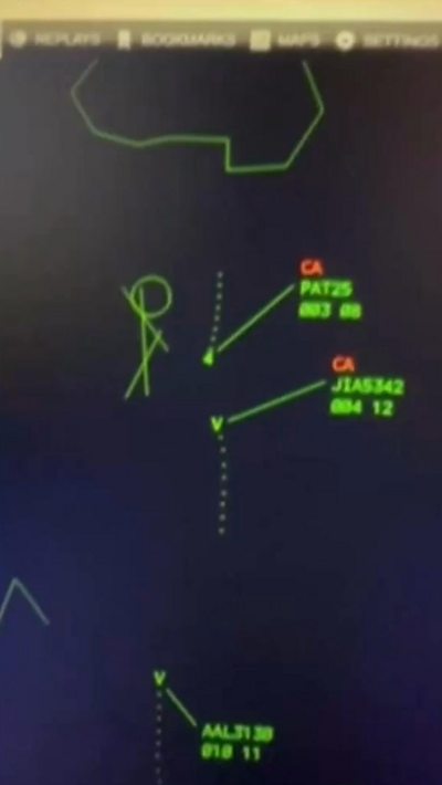 Image of a air traffic control radar screen showing the plane and helicopter heading for collision