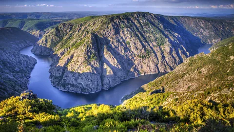 Autumnal landscape of Ribeira Sacra's mountains and river (Credit: Getty Images)