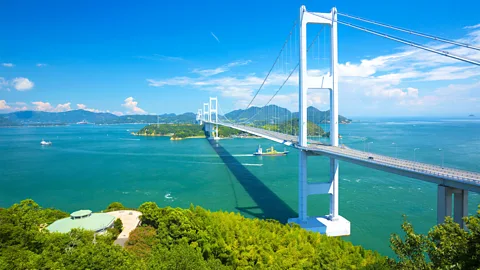 Suspension bridge on Japan's Shimanami Kaido cycling route (Credit: Alamy)