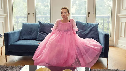 Villanelle (Jodie Comer), the anti-heroine of TV drama Killing Eve, famously wore a pink tulle Molly Goddard gown in the series (Credit: BBC)