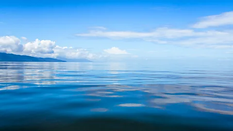 Pierre-Yves Babelon/Getty Images Isolated, small pools of water were more likely to breed early life than huge swathes of deep ocean, scientists believe (Credit: Pierre-Yves Babelon/Getty Images)