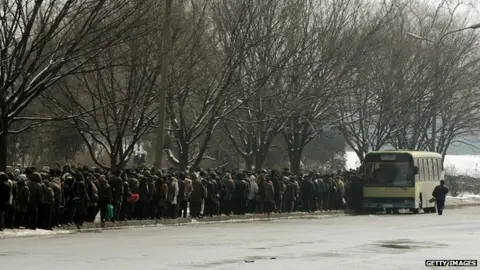 Getty Images Bus queue in North Korea