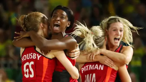 England's netballers celebrate winning gold at the 2018 Commonwealth Games