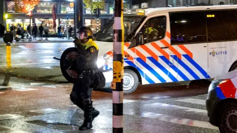 A Dutch police patrols after riots in Amsterdam, Netherlands, November 11, 2024