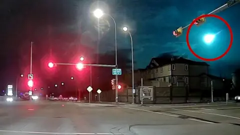 Meteor lights up the night sky.