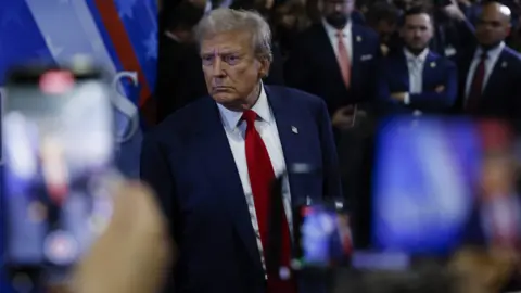 Donald Trump speaking to journalists in the spin room