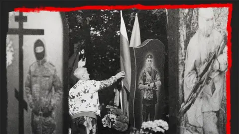 A woman in a graveyard in Kursk, Russia reaches out to touch a gravestone which has a picture of a soldier on it. There are other gravestones and images of soldiers on both sides of her. 